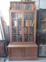 Partially glazed library with shelf