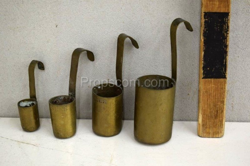 Brass measuring cups