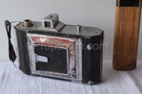 Camera with lens cap