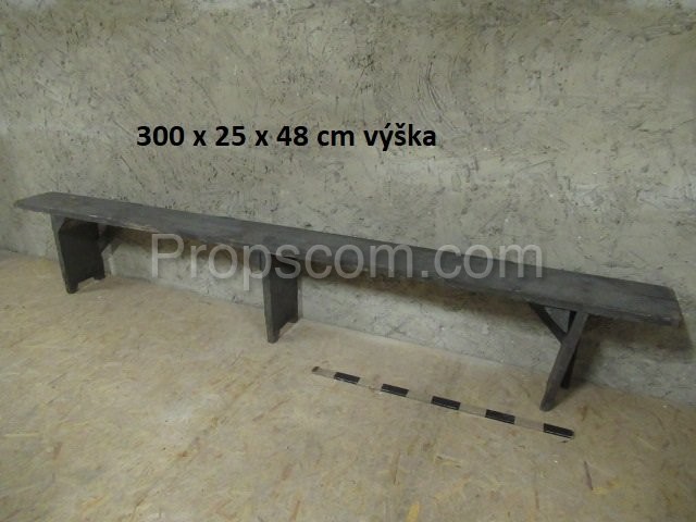 Long gray wooden bench