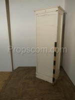 Cabinet with white blinds