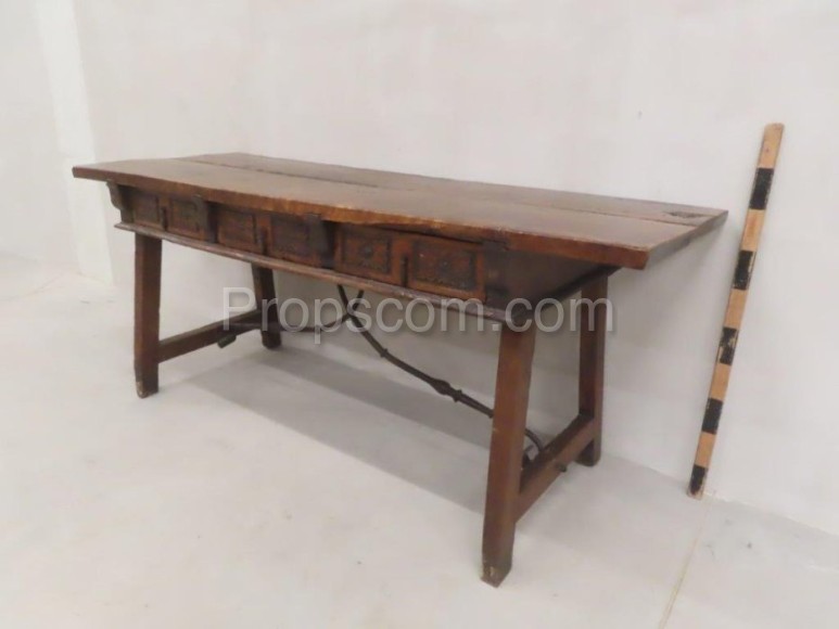 Solid table with forged elements