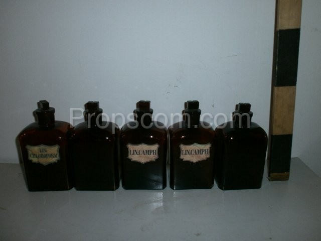 Bottles with ground glass square dark glass