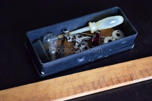 A box of sewing machine parts