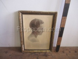 Glazed photo of a woman in a wooden frame
