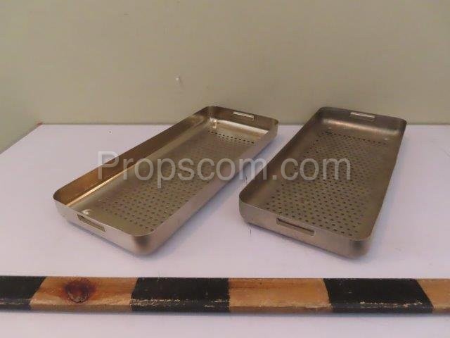 Trays for surgical instruments