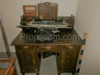 Dark wooden desk with shelf