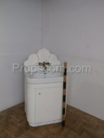 White cabinet with sink decorated