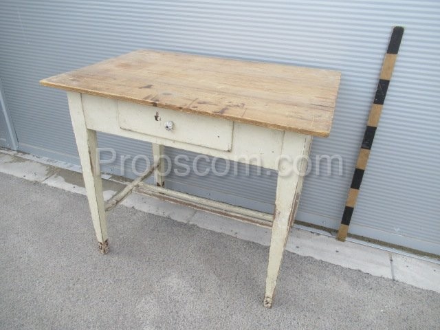 Wooden table with drawer