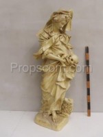 Statue einer Dame mit Totenkopf