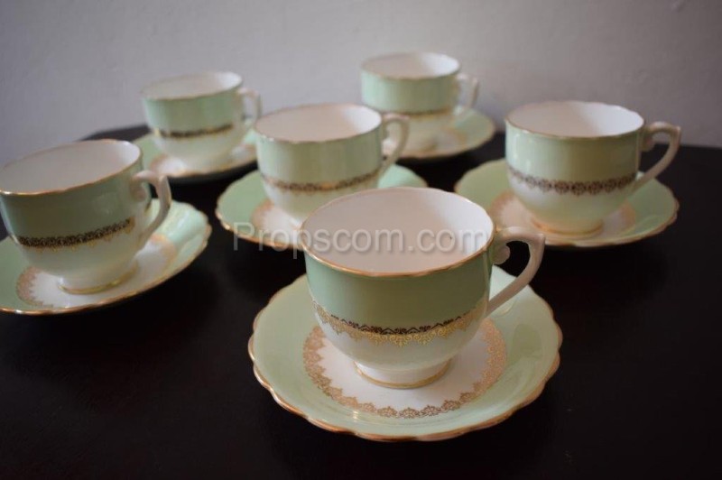 Cups with dessert plates