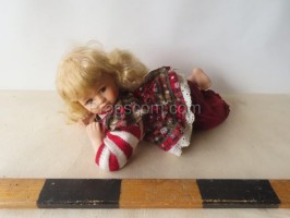 Doll lying down