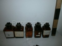 Bottles with ground glass square dark glass