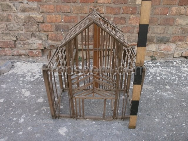 Wooden cage with a roof