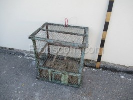 Cage made of wood and mesh