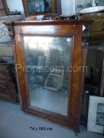Mirror in a wooden polished frame