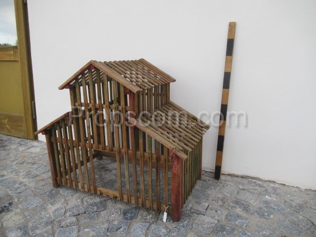 Wooden cage with a roof