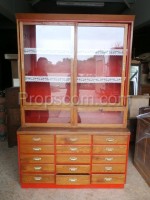 Partially glazed brown-red cabinet