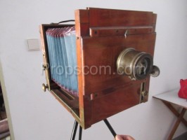 Vintage camera with tripod