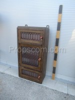 Wooden hanging cabinet decorated