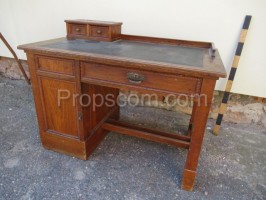 Dark wooden desk with drawers