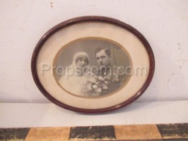 Wedding photos in an oval frame