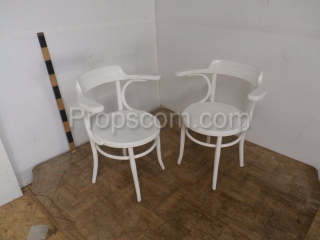 White lacquered wooden chairs