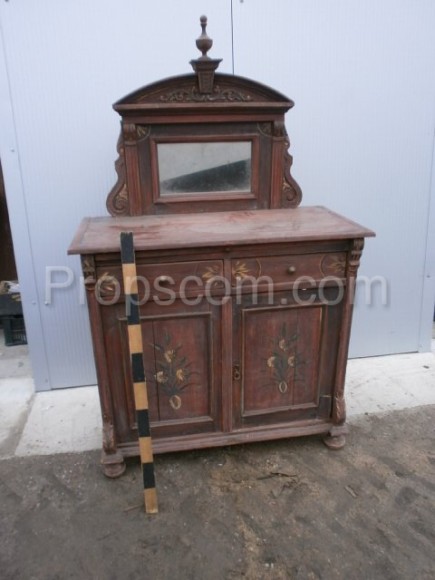 Chest of drawers with a mirror