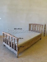 Carved bed