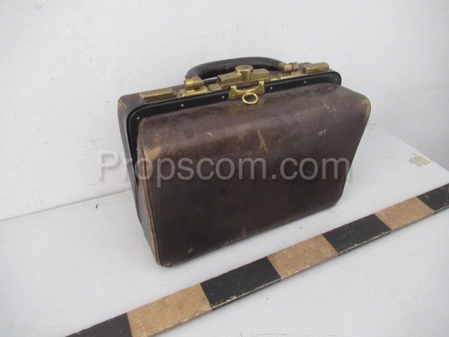 Brass travel suitcase