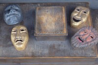 Pedestal with masks