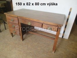 Wooden desk with decorated handles