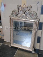 wall mirror with silver ornate frame