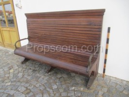 Wooden bench with high back