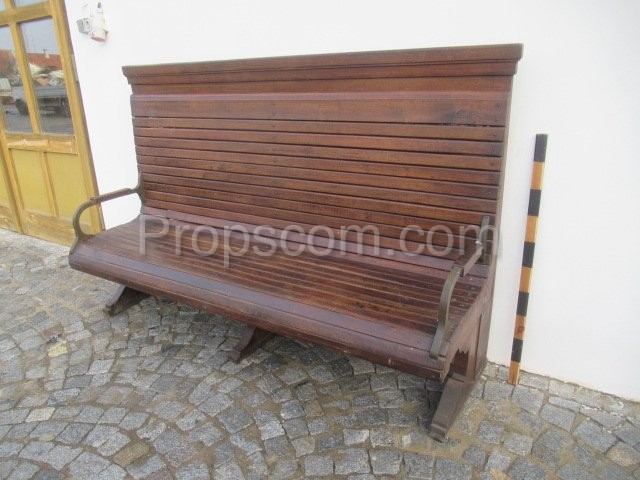 Wooden bench with high back