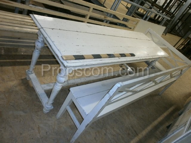 White wooden table with lacquered bench