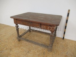 Wooden table with drawer