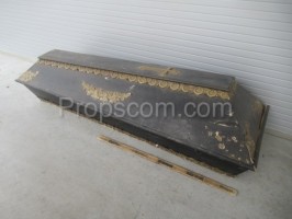 Dark decorated wooden casket