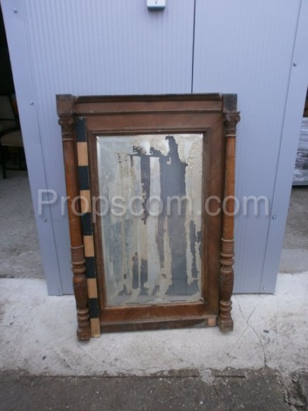 Mirror in a dark wooden frame