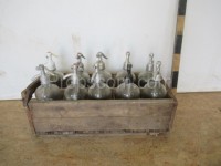 Siphon bottles in crates