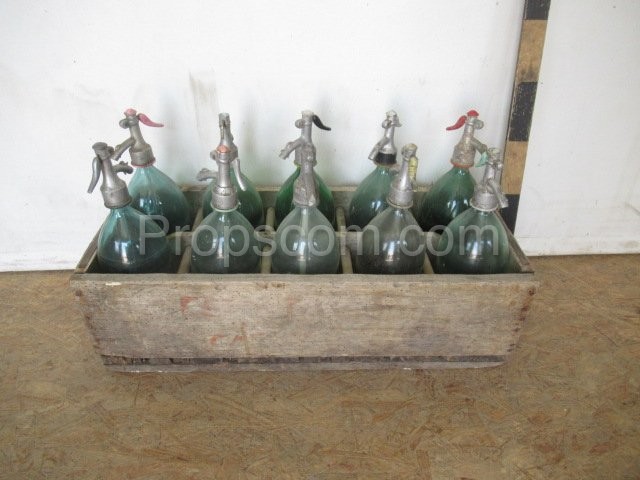 Siphon bottles in crates