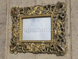 Mirror in a brass frame smaller