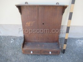 Wooden brown cabinet with drawers and doors