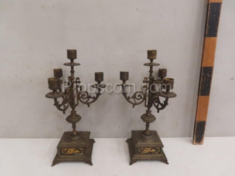 Paired three-armed candlesticks