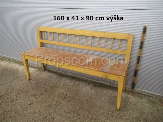 Yellow-brown wooden bench
