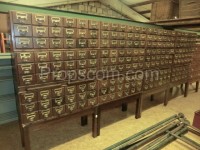 Wooden file cabinet with brass labels