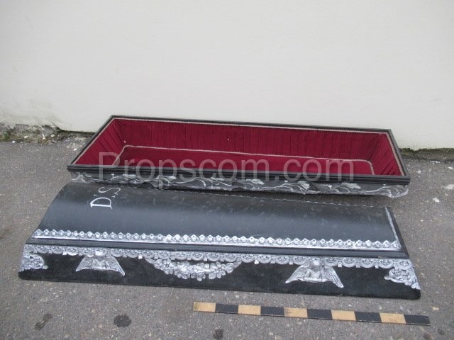 Black casket decorated