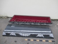 Black casket decorated