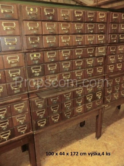 Wooden file cabinet with brass labels
