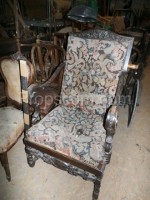 Armchair upholstered carved